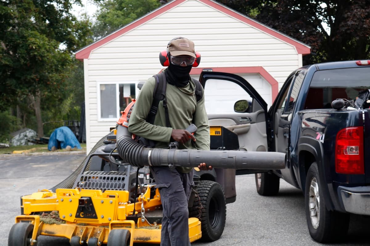 Clearing clippings with a backpack blower