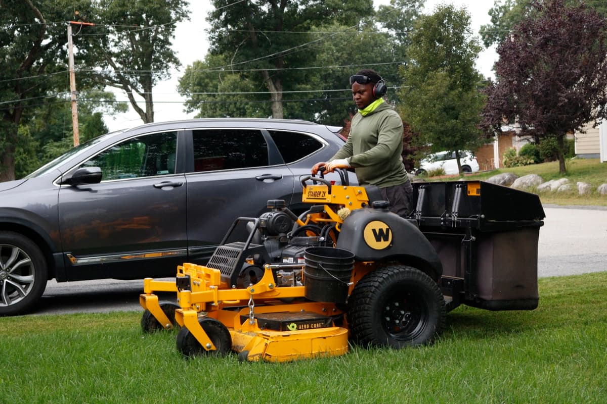 Mowing with a stand-on mower and mulch bagger